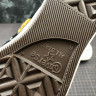 Converse x UNDEFEATED Chuck 70 Black Yellow White 162881C