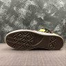 Converse x UNDEFEATED Chuck 70 Black Yellow White 162881C