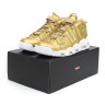 The Supreme x Nike Air More Uptempo Gold